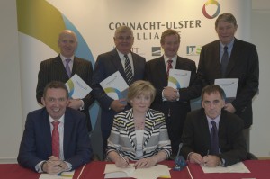 An Taoiseach Enda Kenny, at Galway Mayo Institute of Technology (GMIT), Castlebar Campus for the formal signing of the Connacht-Ulster Alliance between GMIT Letterkenny IT and IT Sligo with Front row from left to right Paul Hannigan, LYIT President, Prof. Terri Scott, IT Sligo President, Michael Carmody, GMIT President, and back row from left to right, Henry McGarvey, Governing Body Chairman, LYIT, Ray MacSharry, Governing Body Chairman, IT Sligo, and Des Mahon, Governing Body Chairman, GMIT. Photo : Keith Heneghan / Phocus