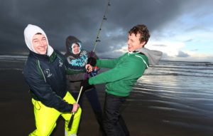 Ronan Keane, Caroline Barlow and Keelan Mannion, taking part in the IT Sligo/R.N.L.I Inaugural Sea Angling Competition at Streedagh Beach in Sligo, yesterday.