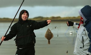 Paul Flanagan lands a Flounder at the IT Sligo/R.N.L.I Inaugural Sea Angling Competition at Streedagh Beach in Sligo, yesterday.