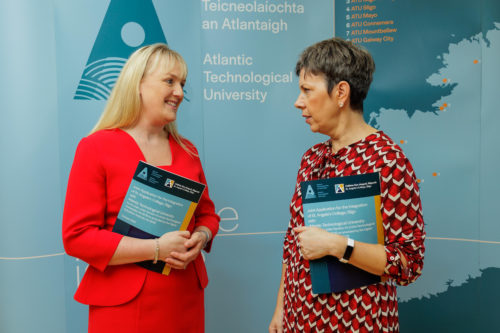 Dr Amanda McCloat, St. Angela’s College President with Dr Orla Flynn, ATU President with a copy of Atlantic Technological University - St. Angela’s College Joint Submission for Integration.