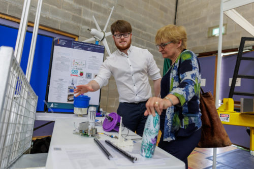 ATU Engineering student, Matthew Barry from Sligo, demonstrates his Smart Renewably Powered Water Pump to ATU Sligo’s Head of College, Úna Parsons at the Engineering Expo.  